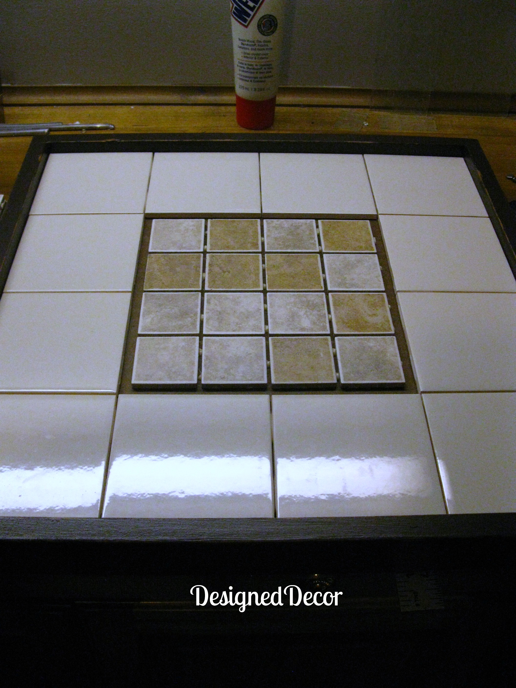 adding tile and grout to the top of the serving tray table